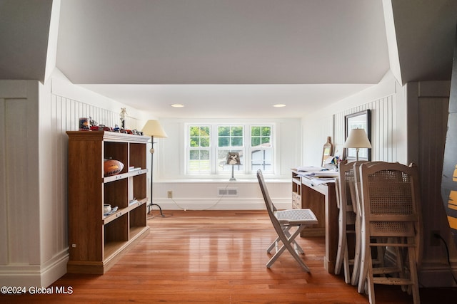 office space with recessed lighting, visible vents, and light wood-style flooring