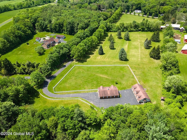 birds eye view of property featuring a rural view