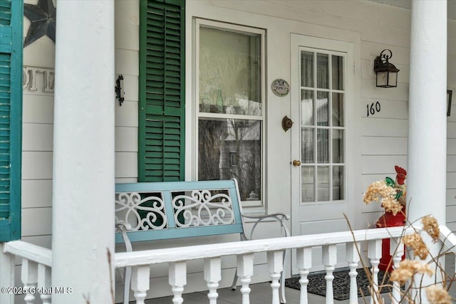 doorway to property with a porch