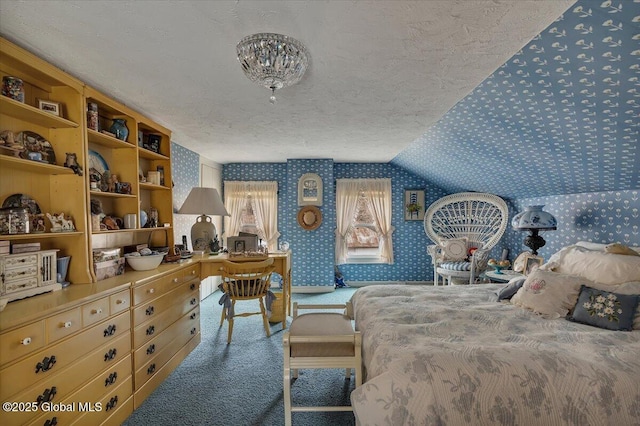 bedroom featuring a textured ceiling, carpet, vaulted ceiling, and wallpapered walls