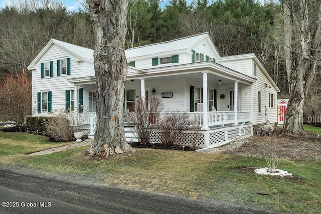 view of front of house featuring a porch and a front lawn