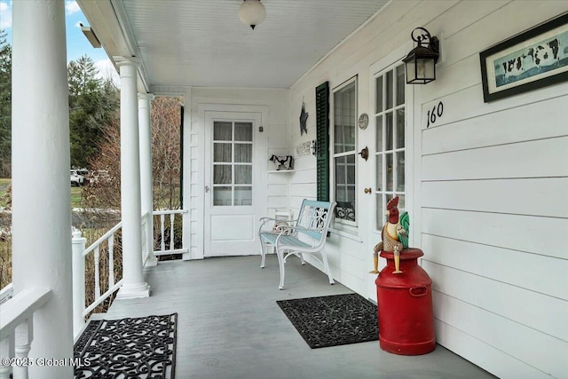 view of patio featuring a porch