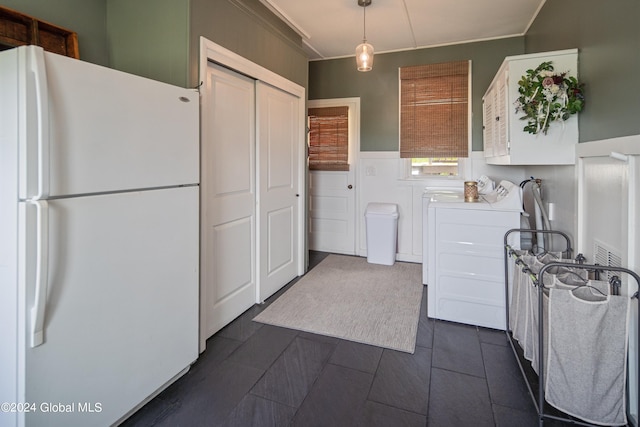 kitchen with freestanding refrigerator