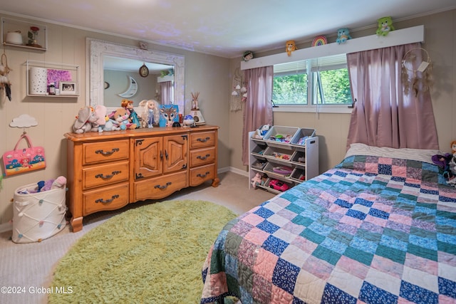 bedroom with carpet floors and ornamental molding