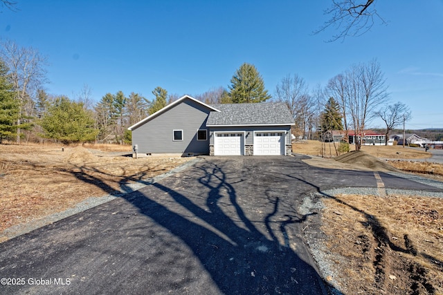 view of front of house featuring a garage and driveway