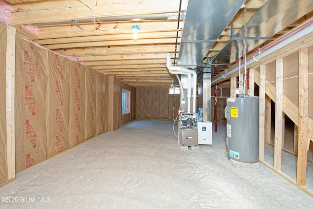 below grade area with heating unit and electric water heater