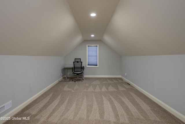 additional living space featuring visible vents, baseboards, vaulted ceiling, carpet floors, and recessed lighting