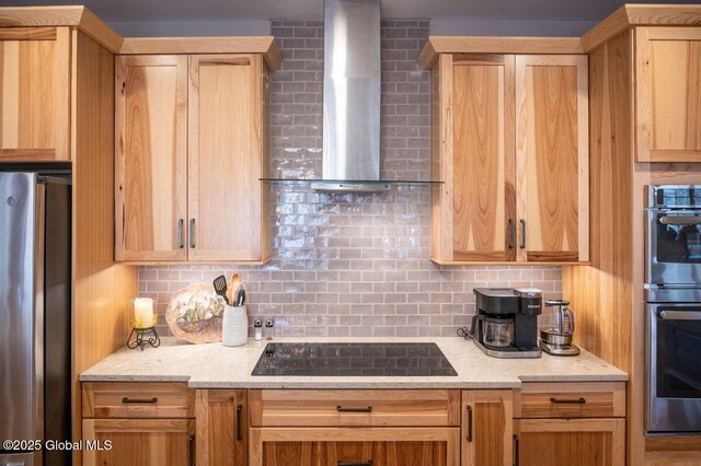 60 Federal Hill Rd, Bolton, NY 12814 - kitchen featuring stainless steel appliances, wall chimney range hood, decorative backsplash, light stone counters, and light brown cabinetry