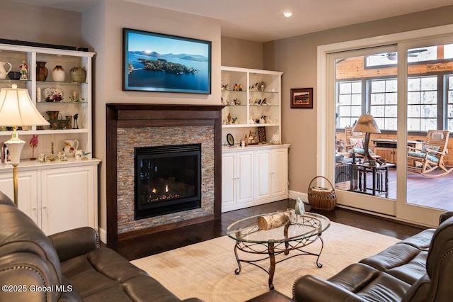 60 Federal Hill Rd, Bolton, NY 12814 - living area featuring a stone fireplace, dark wood-type flooring, and recessed lighting
