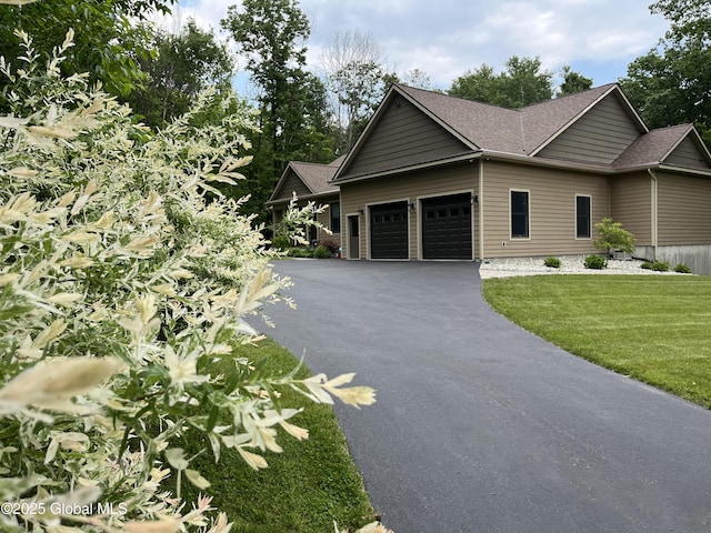 60 Federal Hill Rd, Bolton, NY 12814 - view of front of property featuring driveway, an attached garage, a front lawn, and roof with shingles