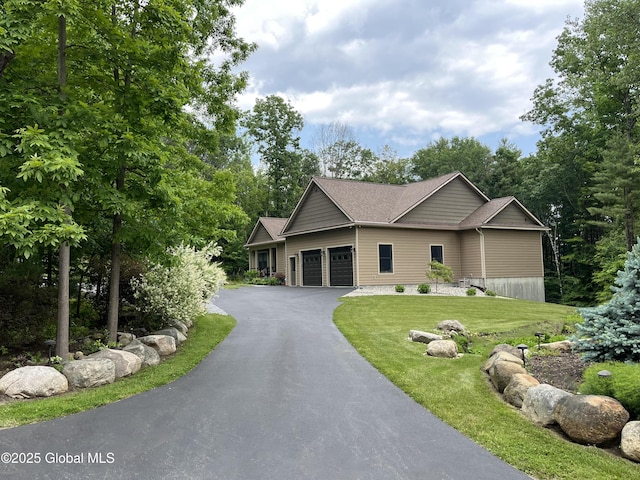 60 Federal Hill Rd, Bolton, NY 12814 - view of front of house with an attached garage, driveway, and a front yard