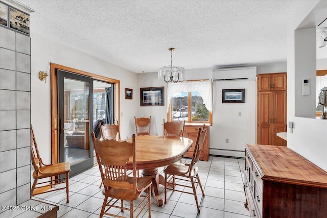 dining area featuring a wall unit AC, an inviting chandelier, light tile patterned flooring, a textured ceiling, and a baseboard radiator