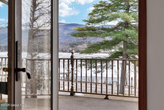 balcony featuring a mountain view