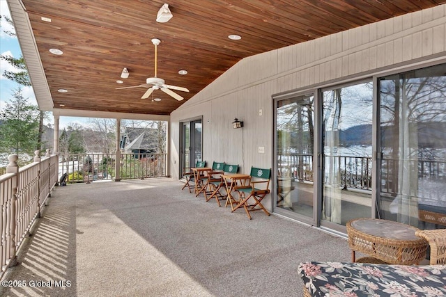 view of patio featuring ceiling fan