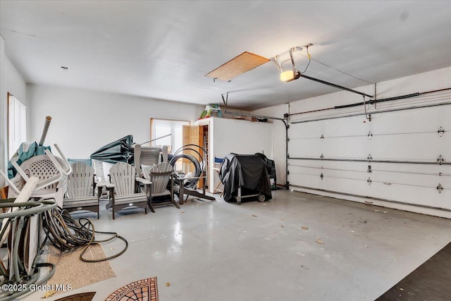 garage featuring a garage door opener