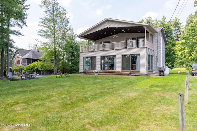 133 Assembly Point Rd, Queensbury, NY 12845 - back of property featuring a balcony, a ceiling fan, a yard, and entry steps