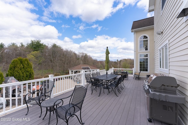 1014 Catherines Woods Dr, Niskayuna, NY 12309 - wooden deck with outdoor dining area, area for grilling, and an outbuilding