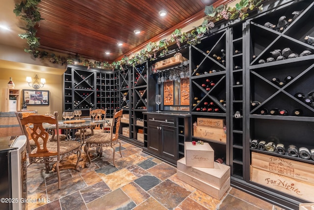 1014 Catherines Woods Dr, Niskayuna, NY 12309 - wine cellar featuring wooden ceiling, stone finish flooring, and recessed lighting