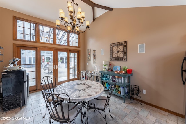 1014 Catherines Woods Dr, Niskayuna, NY 12309 - dining area with stone tile flooring, high vaulted ceiling, a chandelier, beamed ceiling, and plenty of natural light