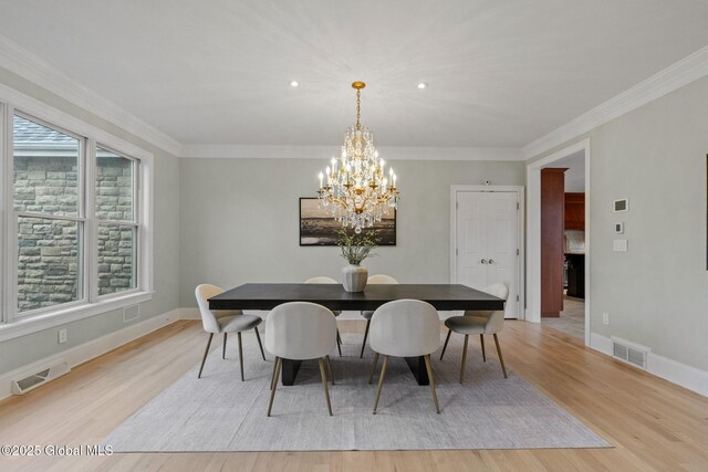 1014 Catherines Woods Dr, Niskayuna, NY 12309 - dining space featuring light wood-style flooring, a chandelier, crown molding, baseboards, and recessed lighting