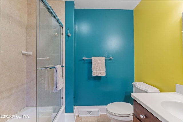 1014 Catherines Woods Dr, Niskayuna, NY 12309 - full bath with a tile shower, toilet, vanity, and tile patterned floors