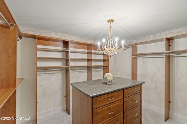 1014 Catherines Woods Dr, Niskayuna, NY 12309 - spacious closet featuring a chandelier and light colored carpet