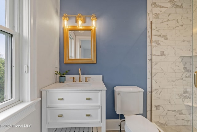 1014 Catherines Woods Dr, Niskayuna, NY 12309 - full bathroom with plenty of natural light, toilet, vanity, and tiled shower