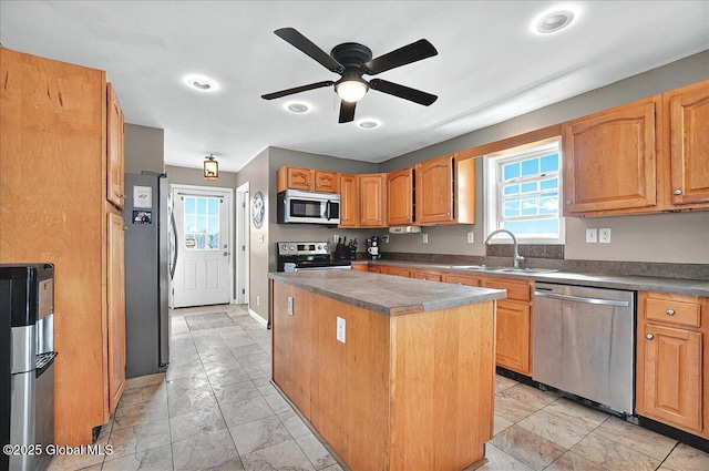 346 State Route 197, Fort Edward, NY 12828 - kitchen featuring a sink, stainless steel appliances, a ceiling fan, marble finish floor, and a kitchen island