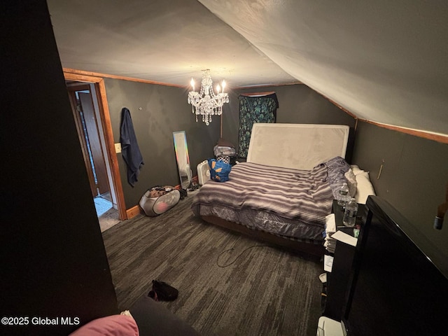 bedroom with a chandelier and vaulted ceiling