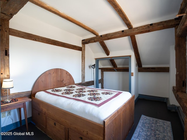bedroom featuring vaulted ceiling with beams