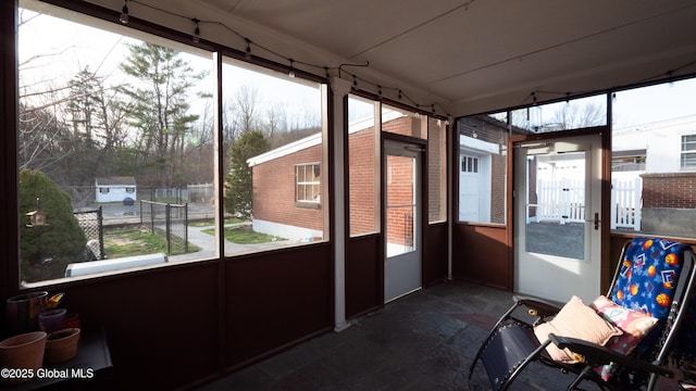 sunroom / solarium featuring plenty of natural light