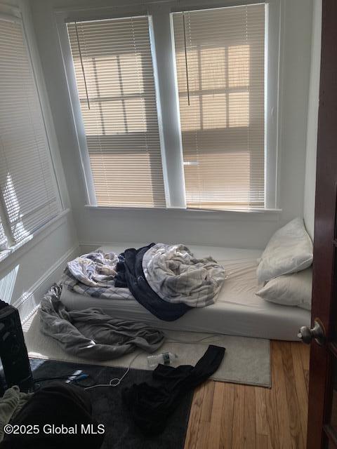 2373 Burdett Ave, Troy, NY 12180 - bedroom featuring wood finished floors