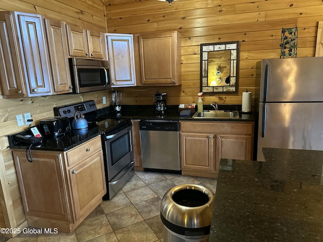 3210 Lake Shore Dr # 34Interval 5, Lake George, NY 12845 - kitchen with wooden walls, a sink, appliances with stainless steel finishes, and light tile patterned flooring