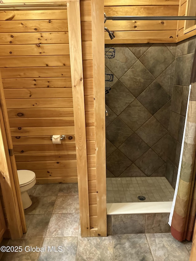 3210 Lake Shore Dr # 34Interval 5, Lake George, NY 12845 - bathroom with toilet, stone finish flooring, and a stall shower