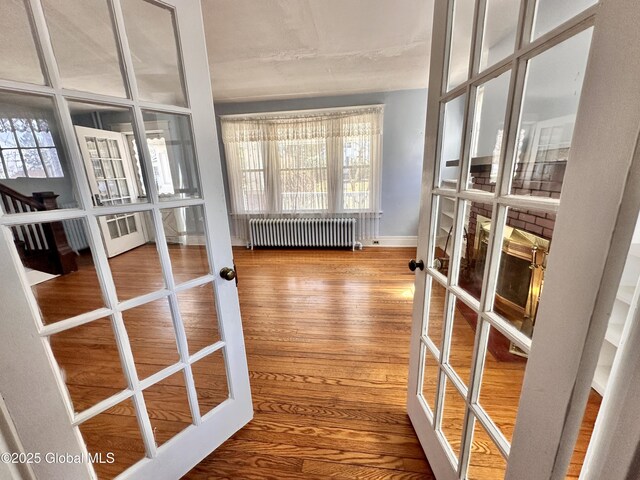 11 Middlesex Rd, East Greenbush, NY 12061 - interior space featuring radiator and french doors