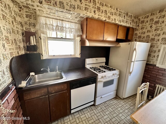 11 Middlesex Rd, East Greenbush, NY 12061 - kitchen featuring a sink, white appliances, under cabinet range hood, and wallpapered walls