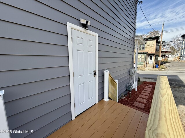9 Brandt Pl, Amsterdam, NY 12010 - wooden deck featuring a residential view