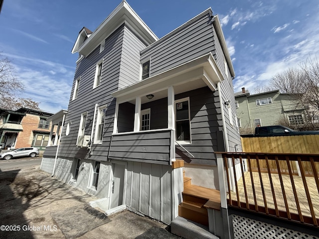 9 Brandt Pl, Amsterdam, NY 12010 - view of front of home with covered porch and fence