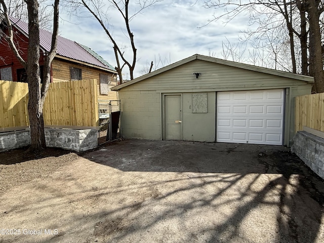 9 Brandt Pl, Amsterdam, NY 12010 - garage featuring fence and driveway