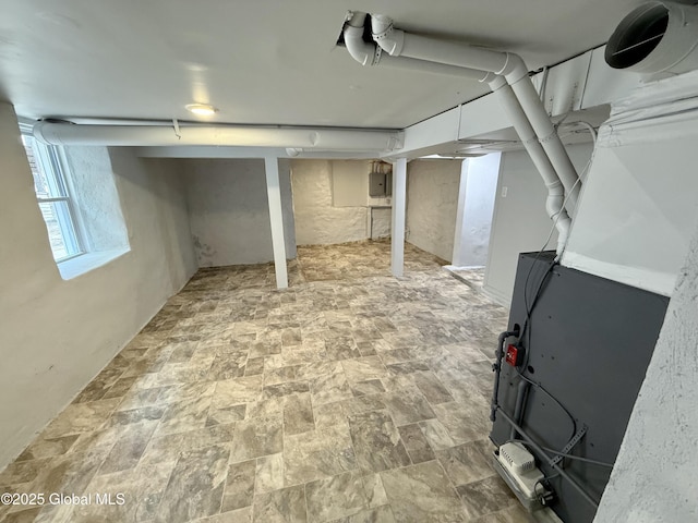 9 Brandt Pl, Amsterdam, NY 12010 - below grade area with electric panel and stone finish flooring