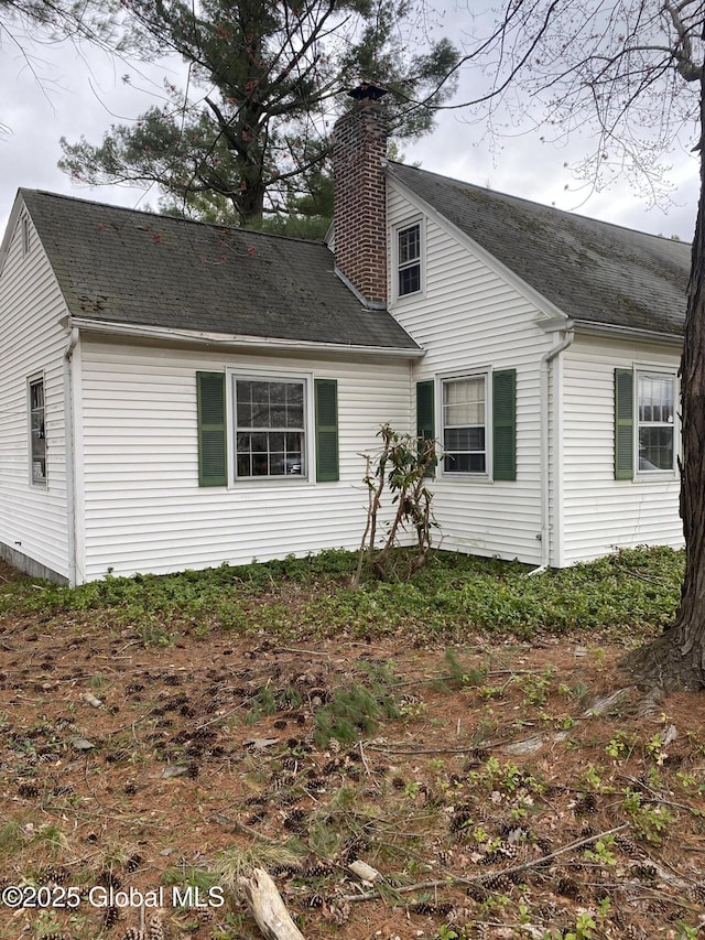 119 Orchard St, Bethlehem, NY 12054 - exterior space with a chimney and a shingled roof