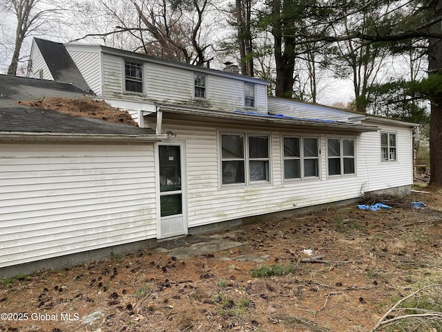 119 Orchard St, Bethlehem, NY 12054 - rear view of property with a chimney