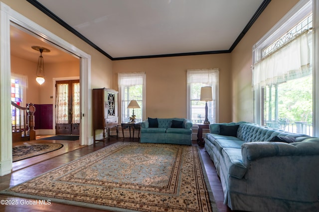 14 Pleasant St, Ballston Spa, NY 12020 - living area featuring wood finished floors, crown molding, and baseboards