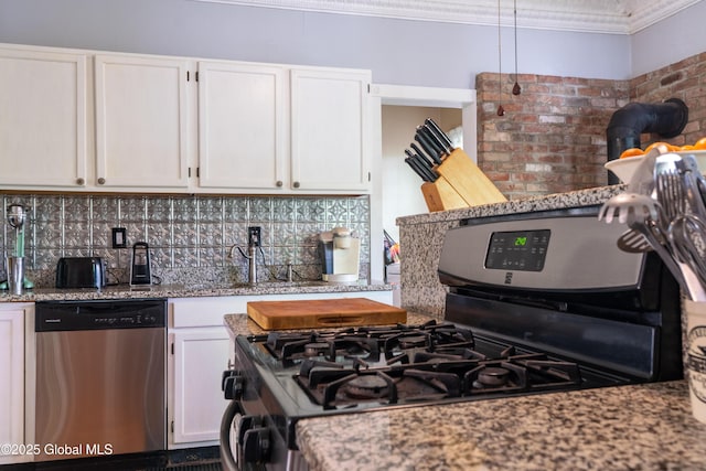 14 Pleasant St, Ballston Spa, NY 12020 - kitchen featuring appliances with stainless steel finishes, ornamental molding, white cabinetry, decorative backsplash, and light stone counters