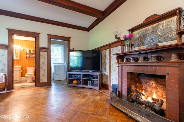 14 Pleasant St, Ballston Spa, NY 12020 - living area featuring washer / dryer, a fireplace, beamed ceiling, and crown molding