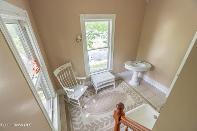 14 Pleasant St, Ballston Spa, NY 12020 - bathroom with tile patterned flooring, baseboards, and a bidet
