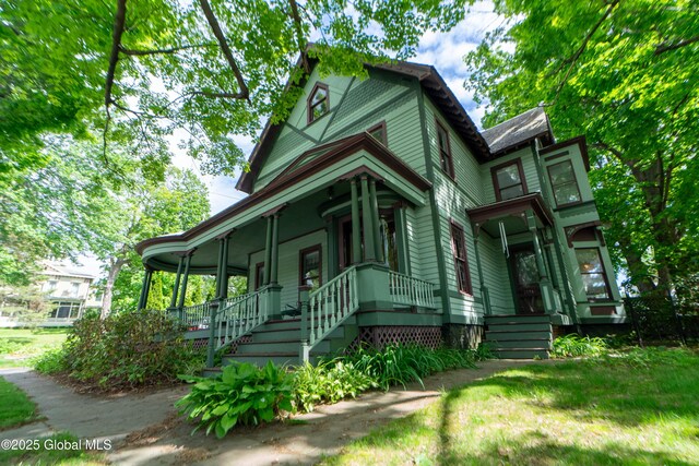 14 Pleasant St, Ballston Spa, NY 12020 - victorian home with covered porch and stairway