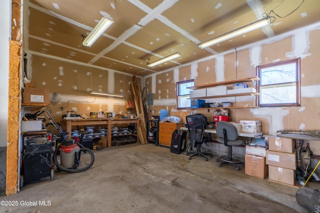 garage featuring a workshop area