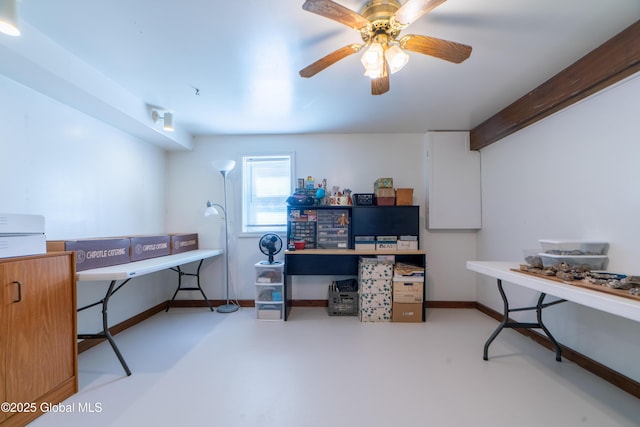 office featuring baseboards, beamed ceiling, ceiling fan, and concrete flooring