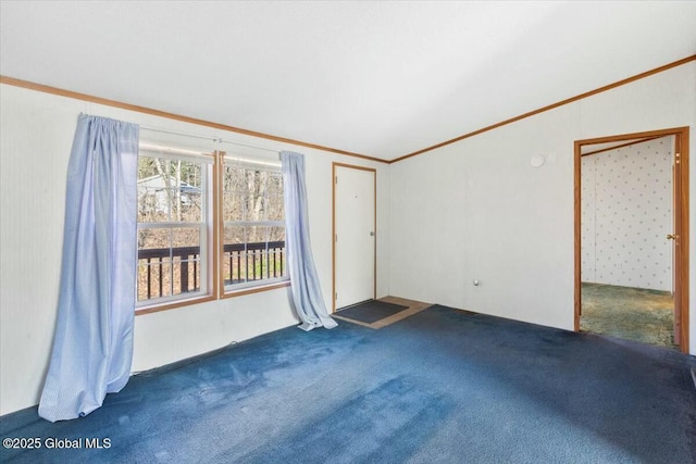 carpeted empty room with crown molding